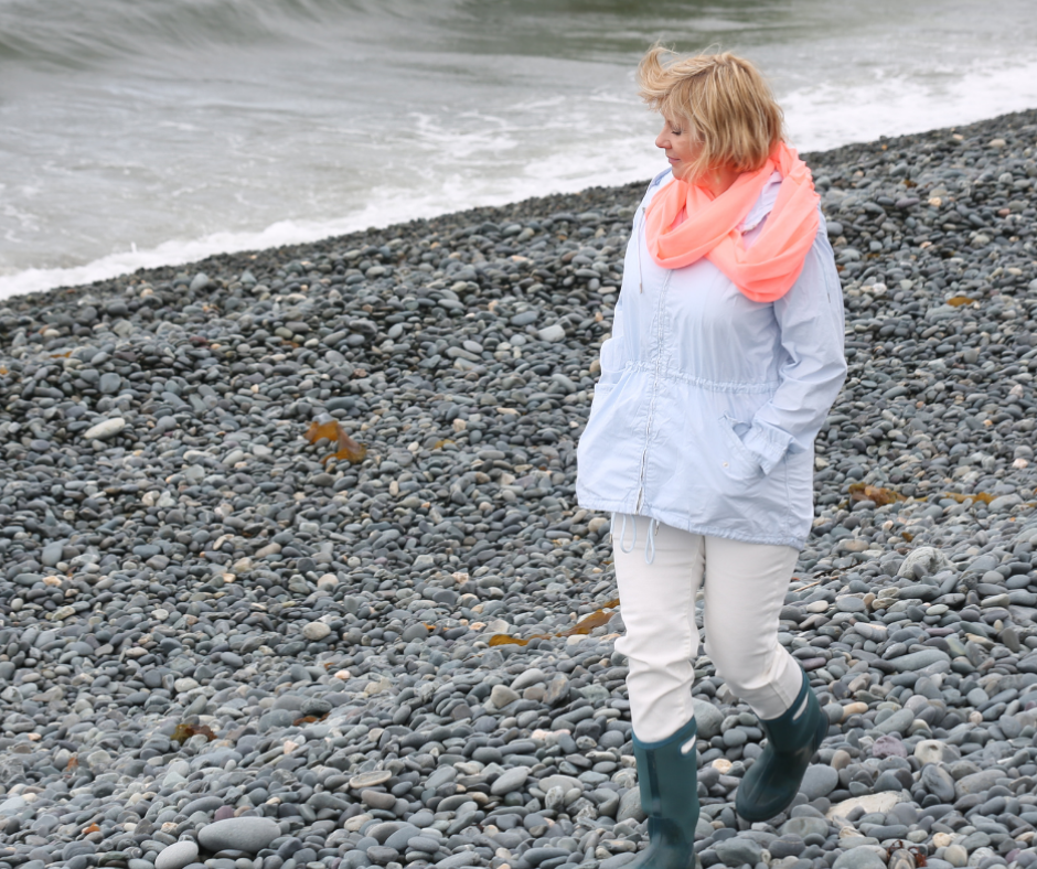 Lisa Walsh, Founder of Island Skincare  walking Topsail Beach.